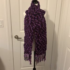A hand-knitted woman’s scarf.